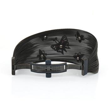 ARMBAND, rostfritt svart stål, rubiner och små diamanter.