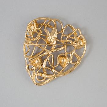 BROSCH, Yves Saint Laurent.