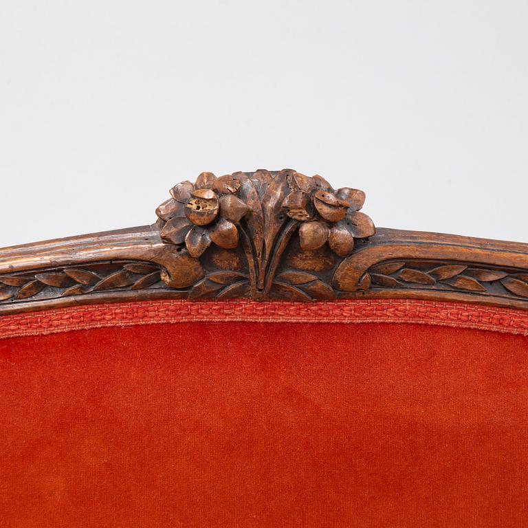 A Louis XV sofa, France, mid 18th Century.