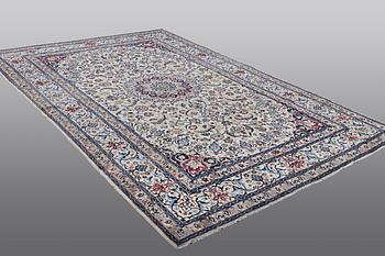 A carpet, Nain, so called 9 laa, part silk, ca 360 x 240 cm.