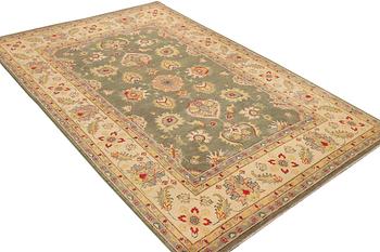A Kazak carpet, c. 304 x 195 cm.
