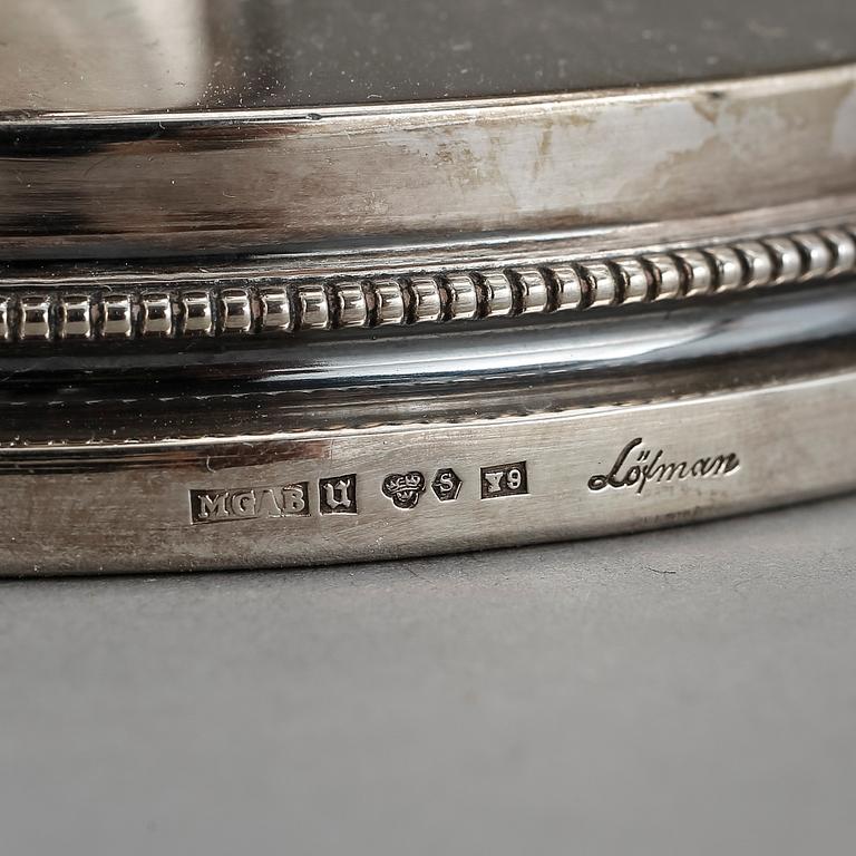 LJUSSTAKAR, ett par, silver. Erik Löfman, MGAB, Uppsala, 1973 och 1974.