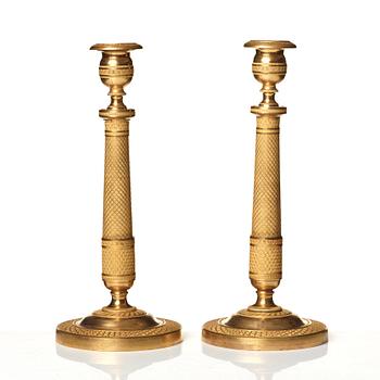 A pair of Empire candlesticks.