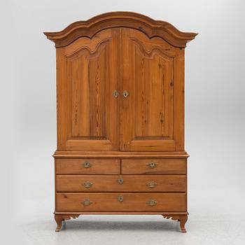 An 18th two-part pine century cabinet.