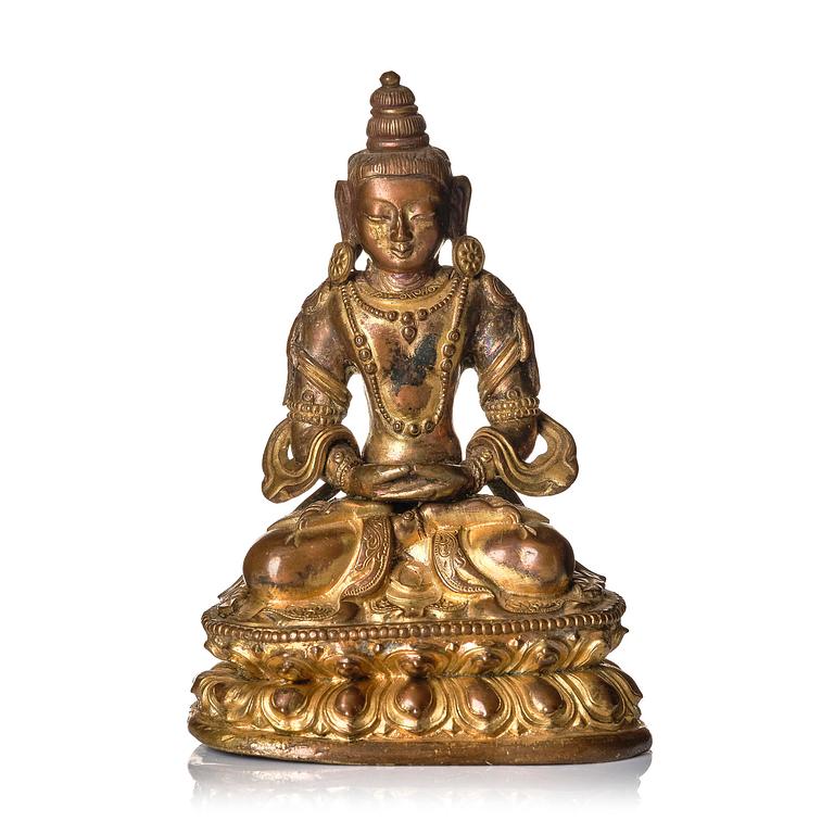 A gilt copper alloy figure of Amitayus, Tibeto-Chinese/Mongolia, 18th century.