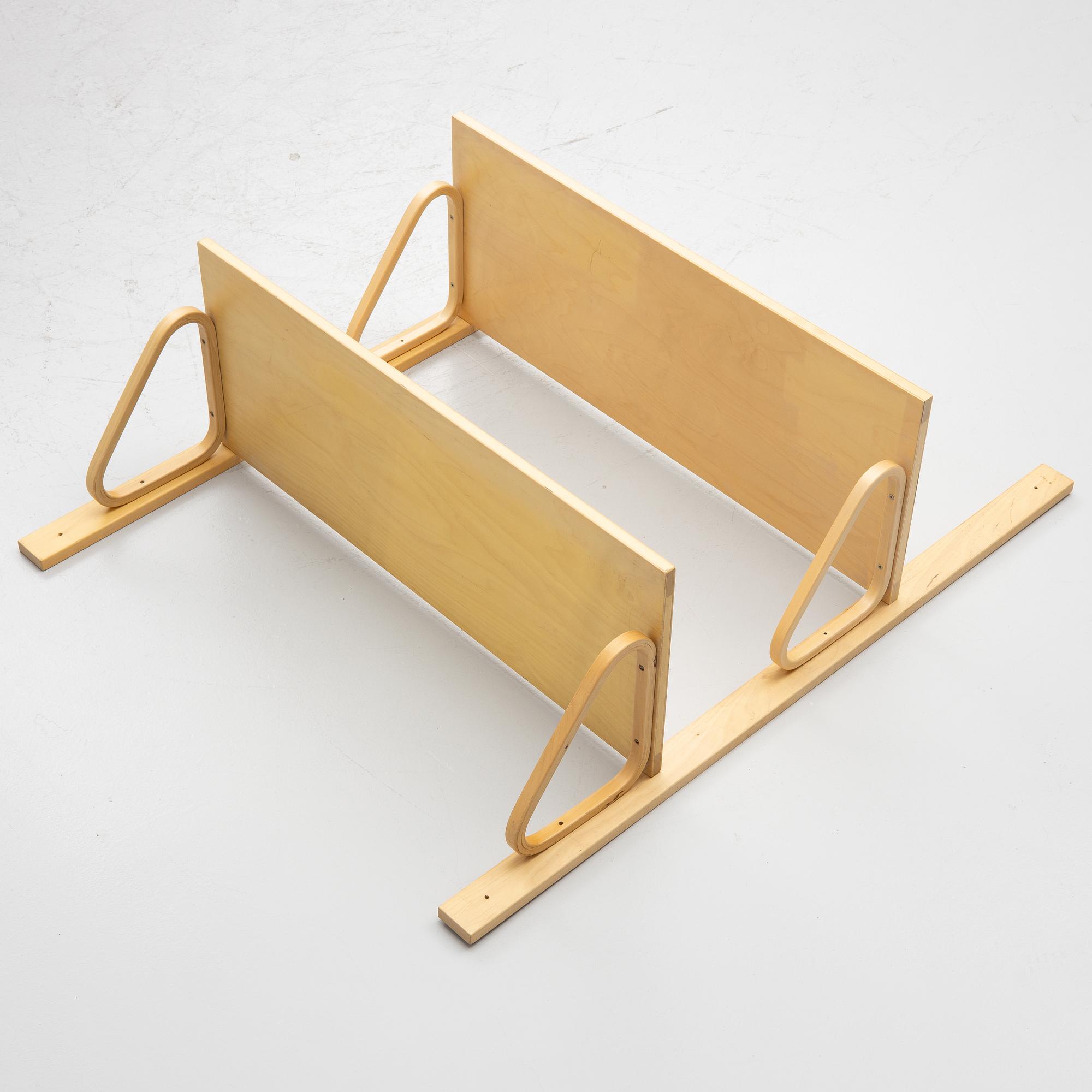 Alvar Aalto, a pair of wall shelves, model 112A, Artek, Finland, late 20th Century.