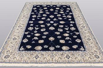 A carpet, Nain part silk s.k 9LAA, ca 312 x 199 cm.