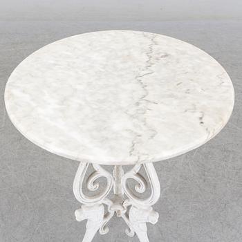 a late 20th century cast iron garden table.