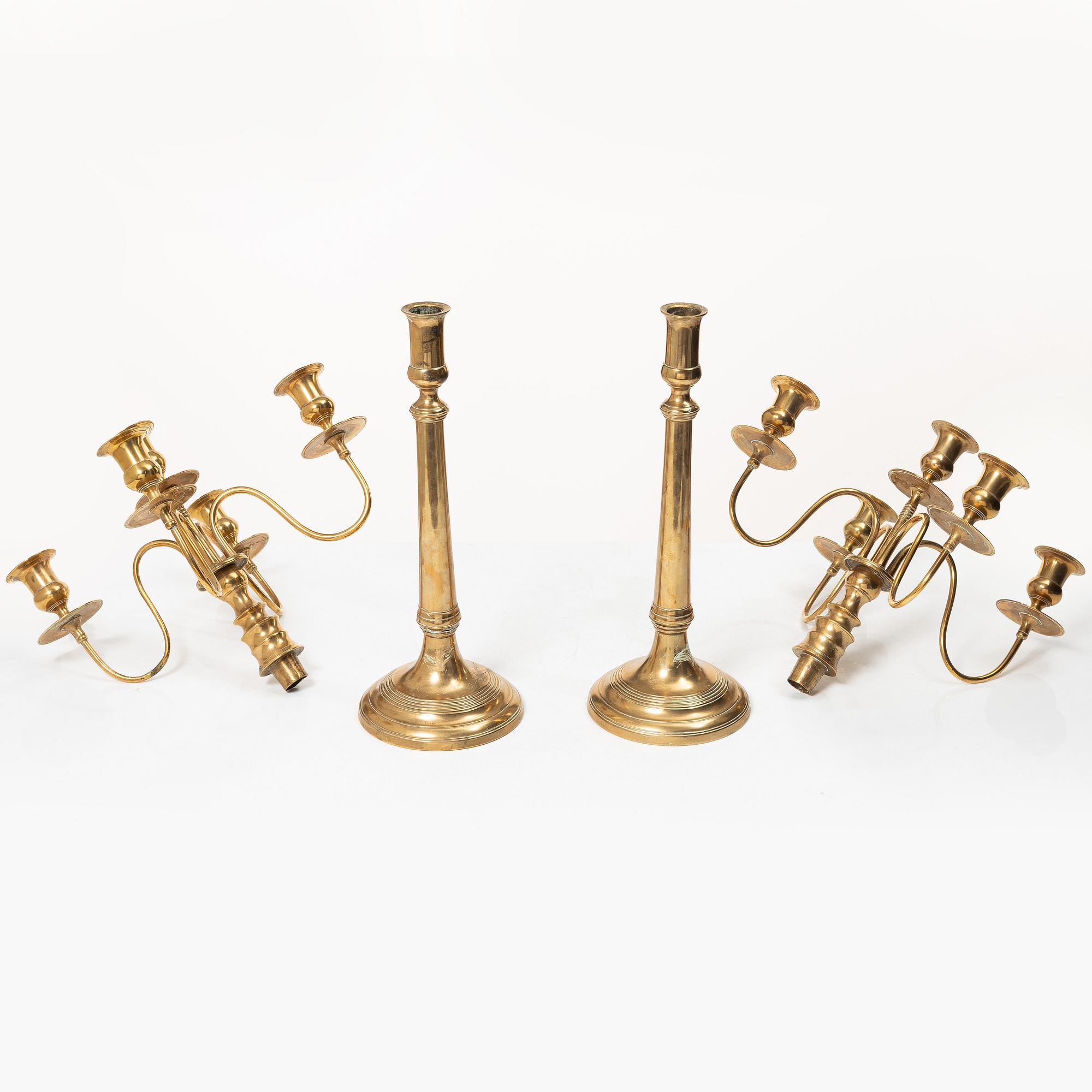 A pair of brass candelabra, model N12, Nyköpings Bruk, Sweden, around 1900.