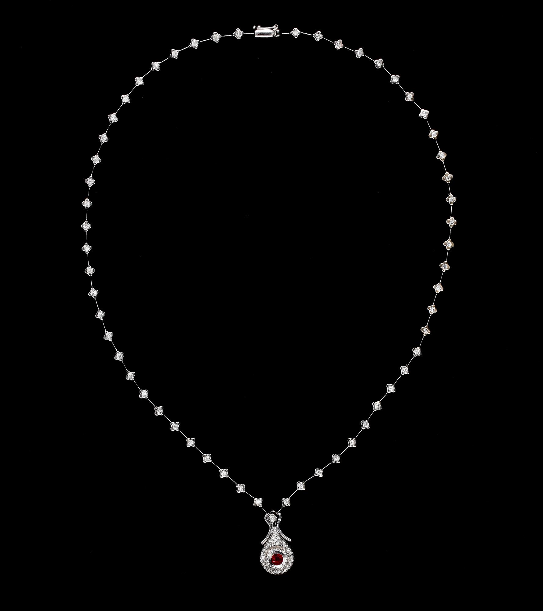 COLLIER, rubin med briljantslipde diamanter, tot. ca 1.80 ct.
