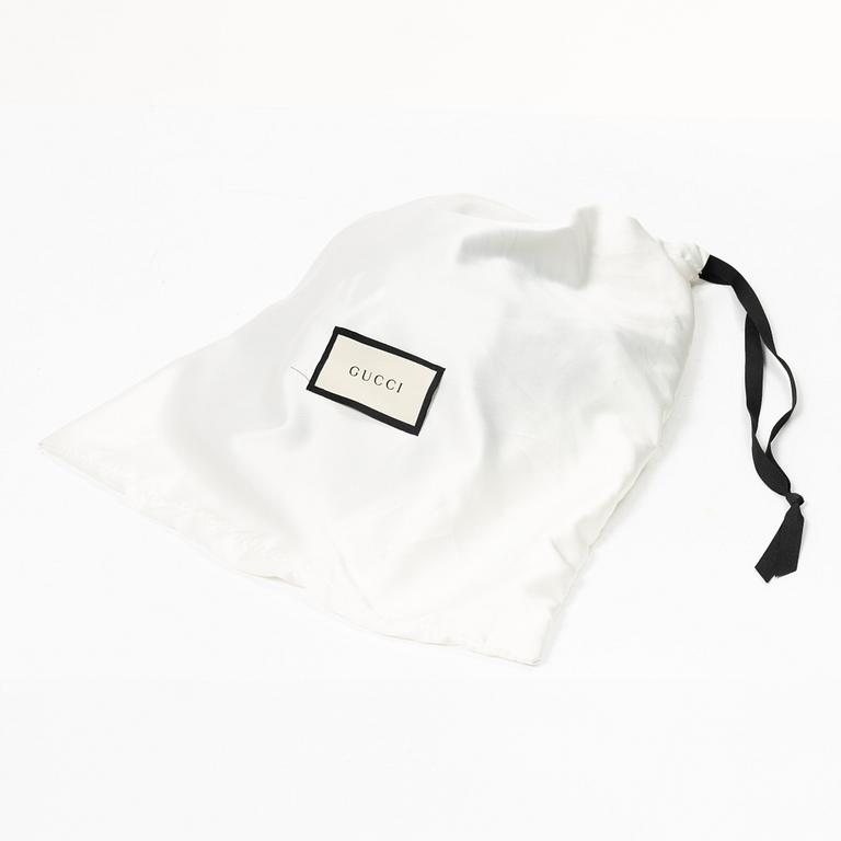 Gucci, NY Yankees baseball cap.