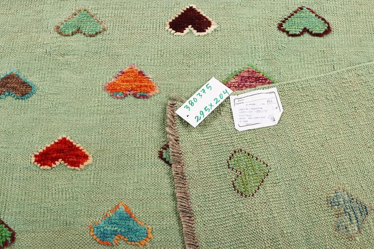 An Afghan kelim carpet, c. 295 x 204 cm.
