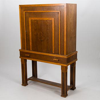 A 1920's oak cabinet.