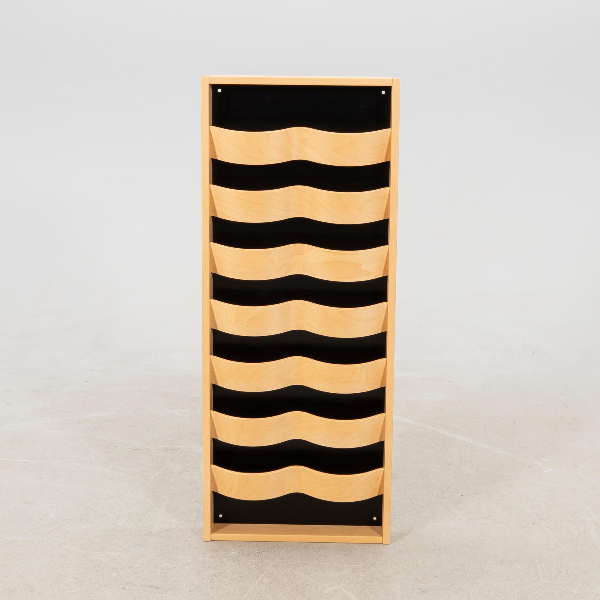 Magazine rack "Materia Vågspel" Rafz, 21st century.