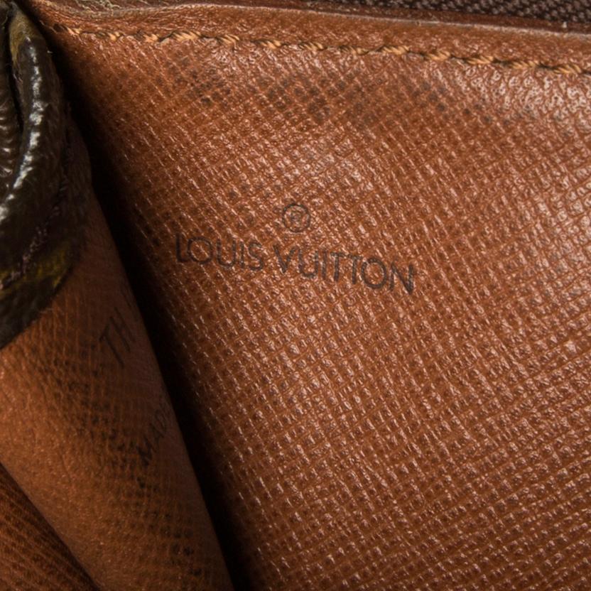 A "Pochette Documents" bag by Louis Vuitton.