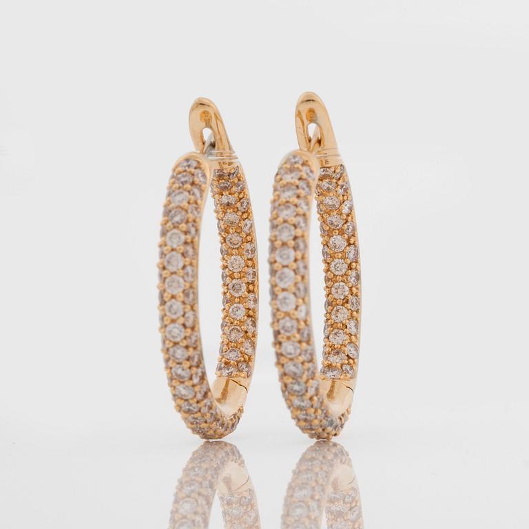 A pair of brilliant-cut hoop earrings. Total carat weight circa 3.29 cts.