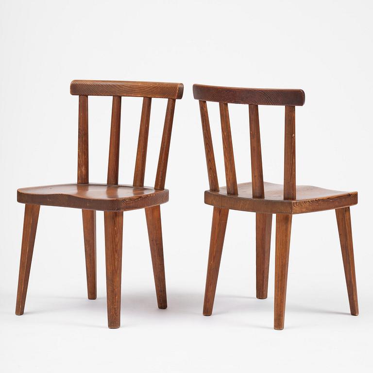 Axel Einar Hjorth, a set of four stained pine "Utö" chairs, Nordiska Kompaniet, Sweden, 1930s.