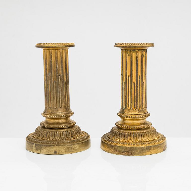 A pair of Louis XVI candelholders, first half of the 19th century.