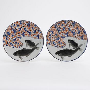 A pair of Japanese porcelain "carp" dishes, first half of the 20th Century.