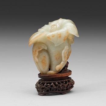 288. A celadon nephrite floral group, Qing dynasty (1644-1944).