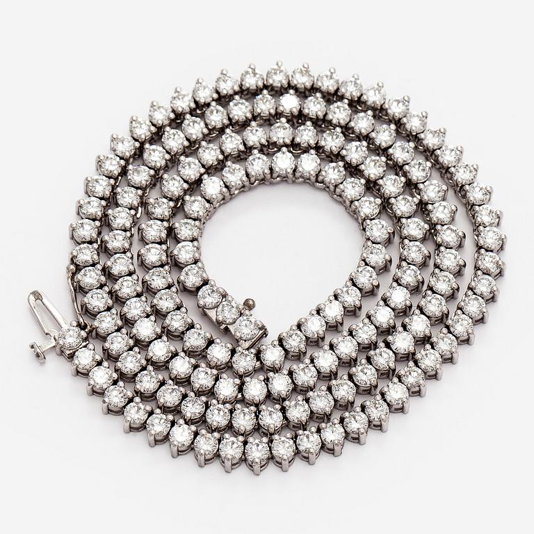 Kaulakoru, 18K valkokultaa ja briljanttihiottuja timantteja.