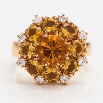 An 18K gold ring "Catherine the great" with citrines and ca. 0.20 ct of diamonds. Ofelia Jewelry, Helsinki 1998.