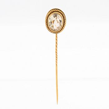 Brooch in 18K gold with an oval faceted citrine, Carl Ohlsson Karlskrona, early 20th century.