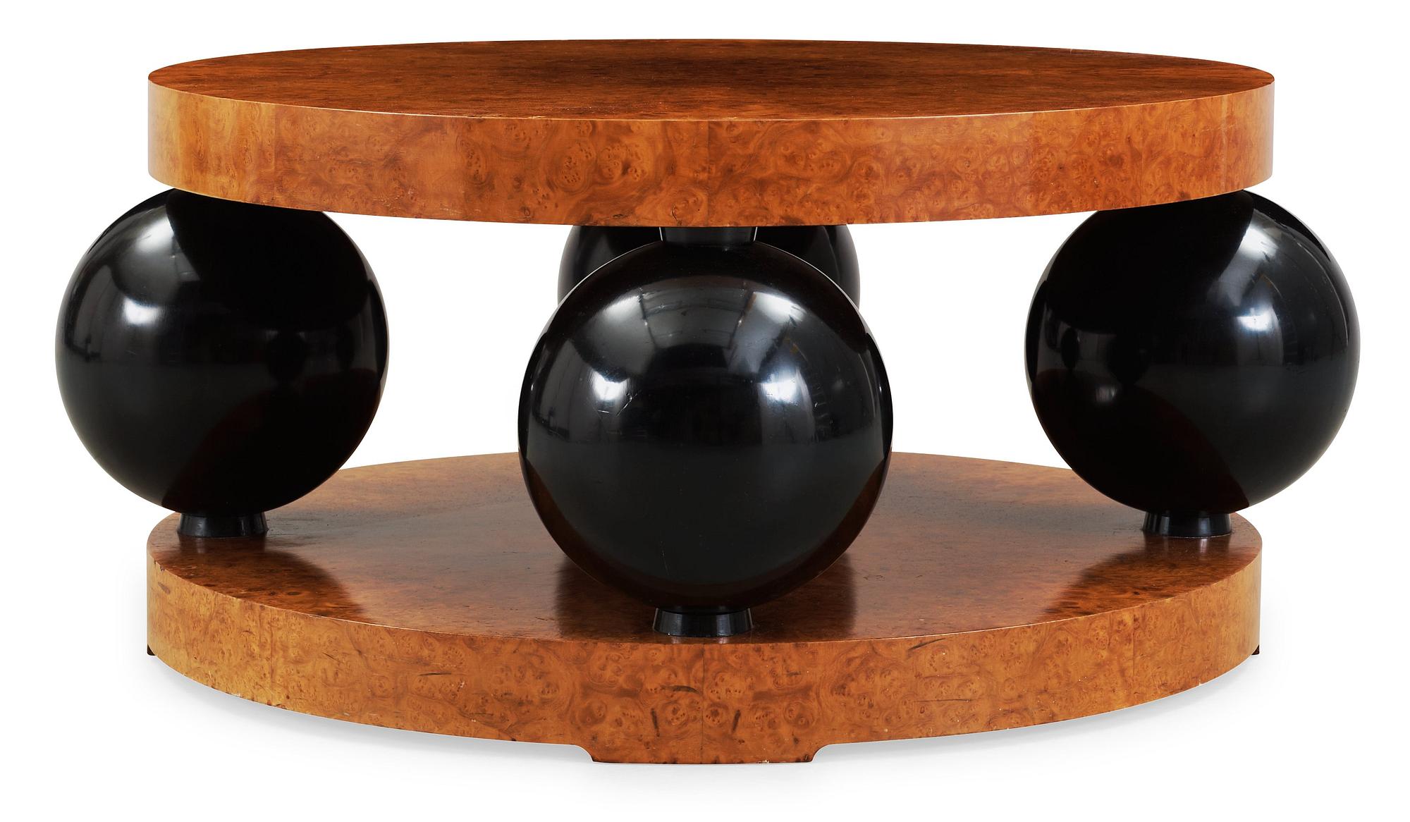 An Erik Johansson burr wood and blacquered sofa table,
Reiners Möbelfabrik, Sweden 1941.