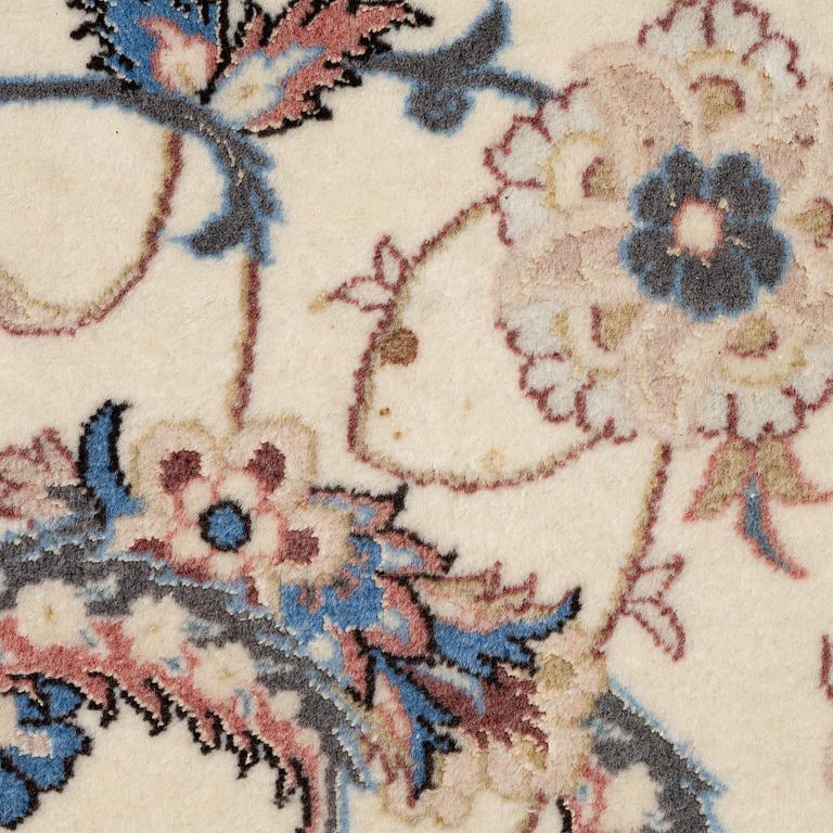 An Isfahan carpet, signed, approx. 372 x 255 cm.