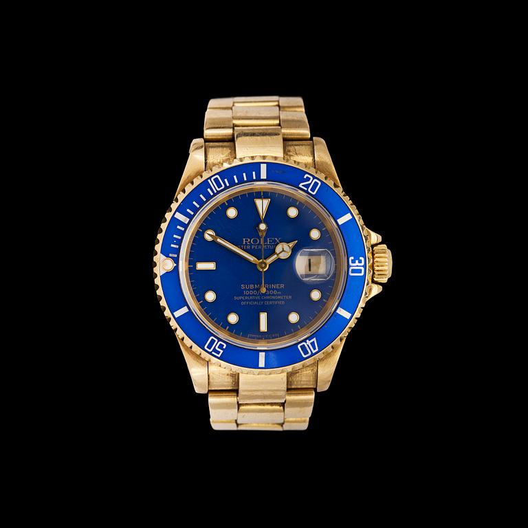A Rolex Submariner gentleman's gold watch. 1991.