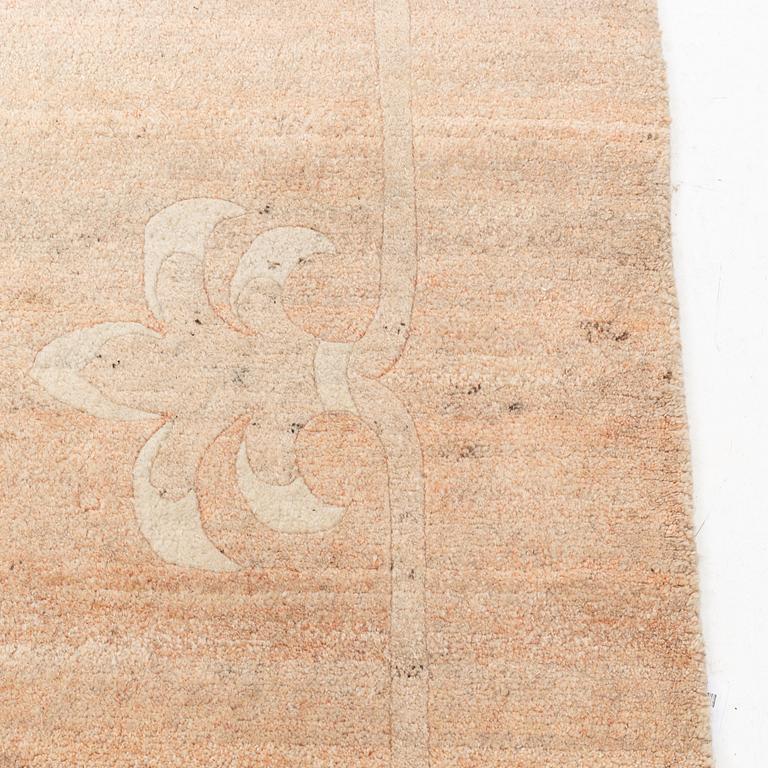 A Chinese carpet, c. 330 x 270 cm.