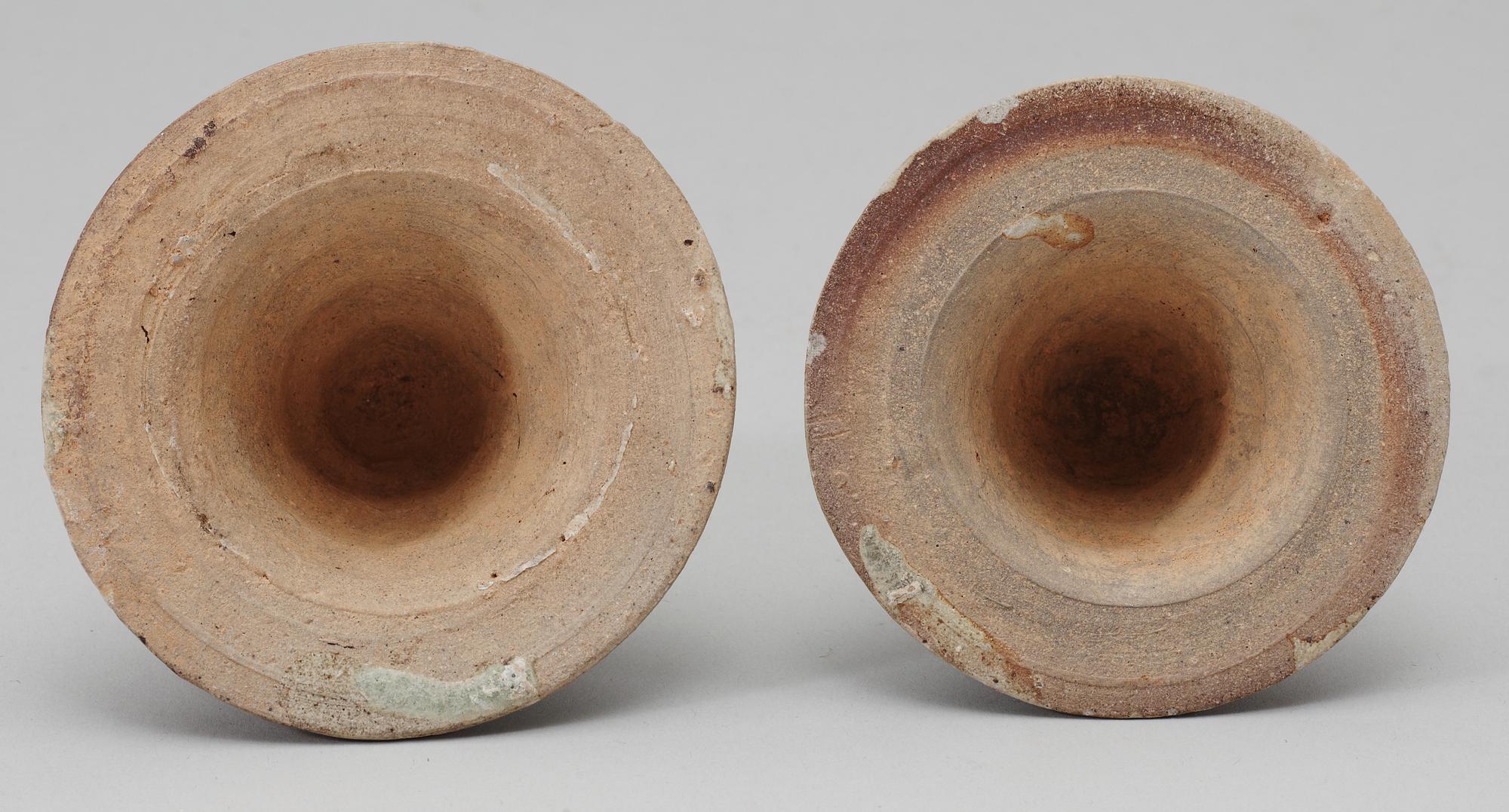 A set of two green glazed vases with covers, Yuan dynasty (1271-1368).