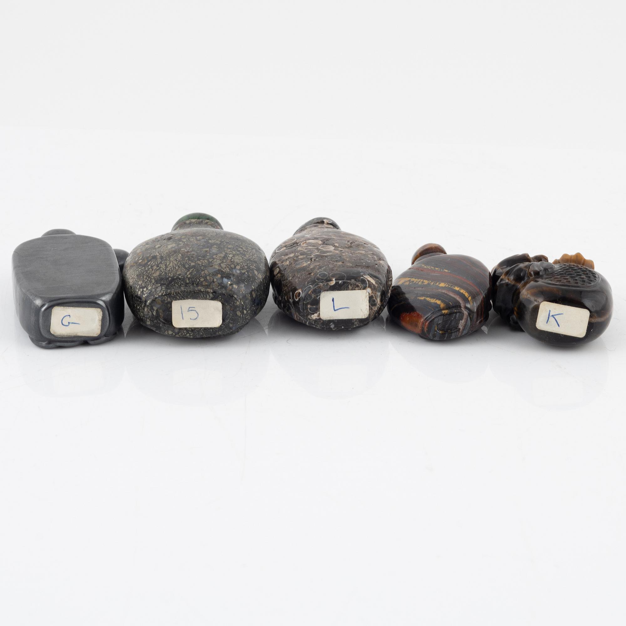 Ten snuff bottles, mottled stone, China, 20th century.