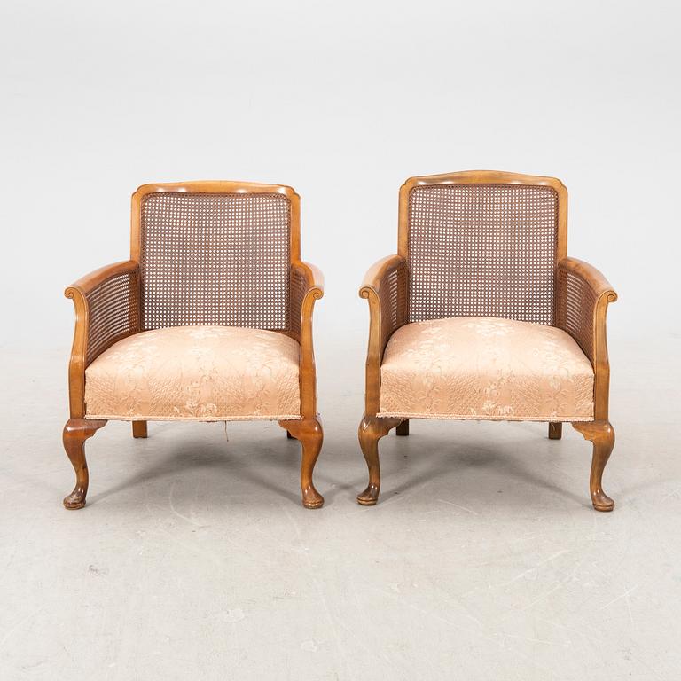A pair of 1940/50s armchairs.