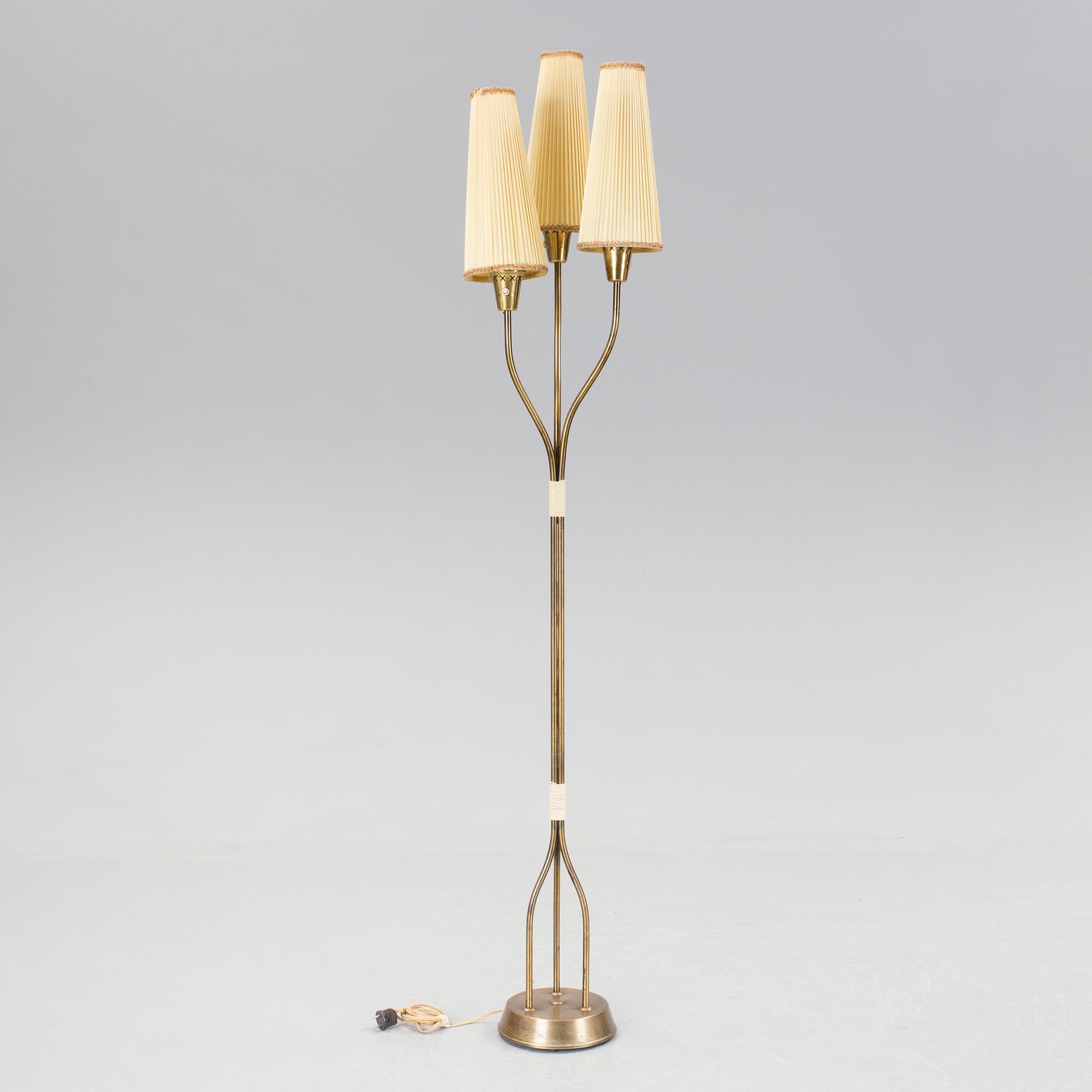 A brass standard lamp, 1950's/60's.