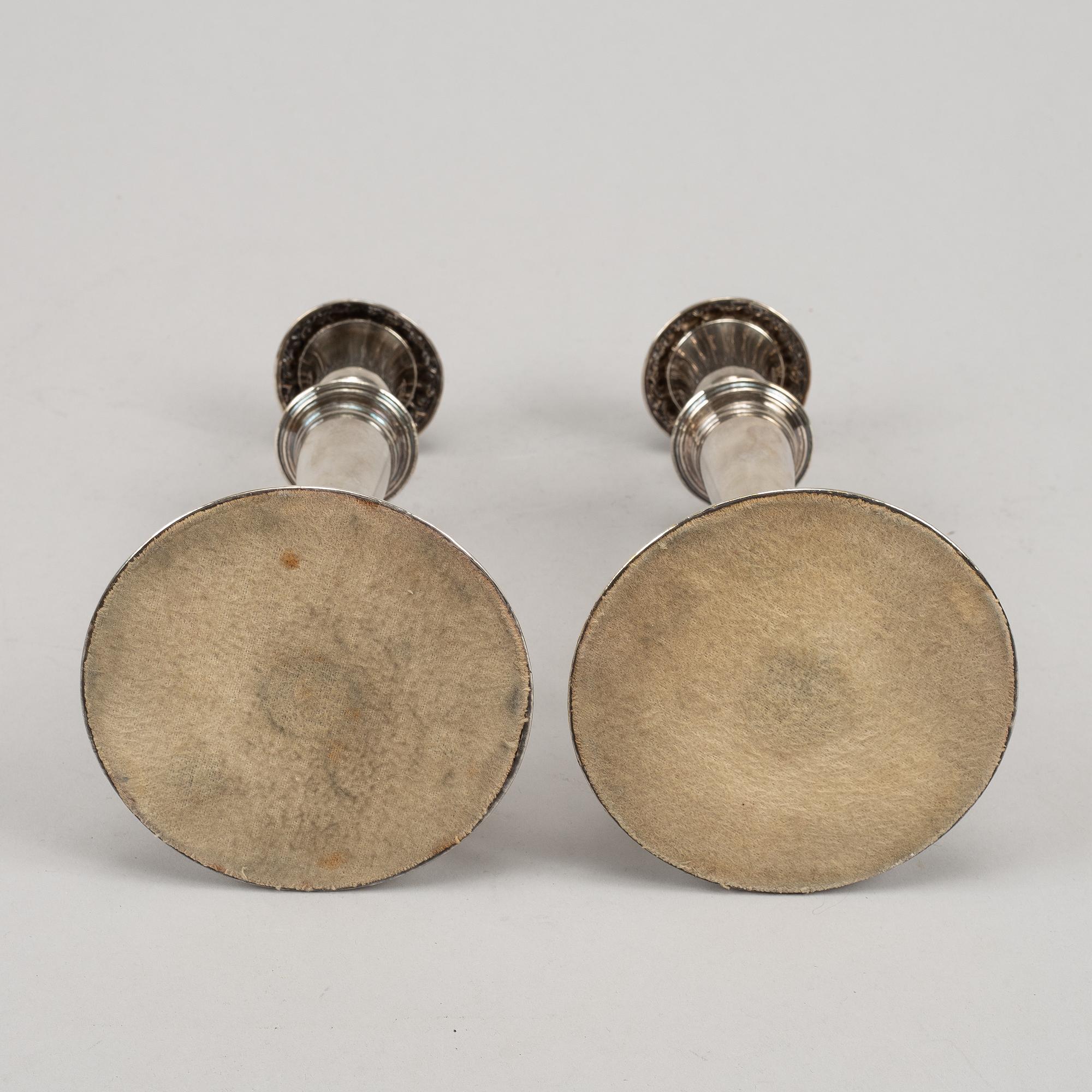 A pair of 19th century silver-plated candlesticks.