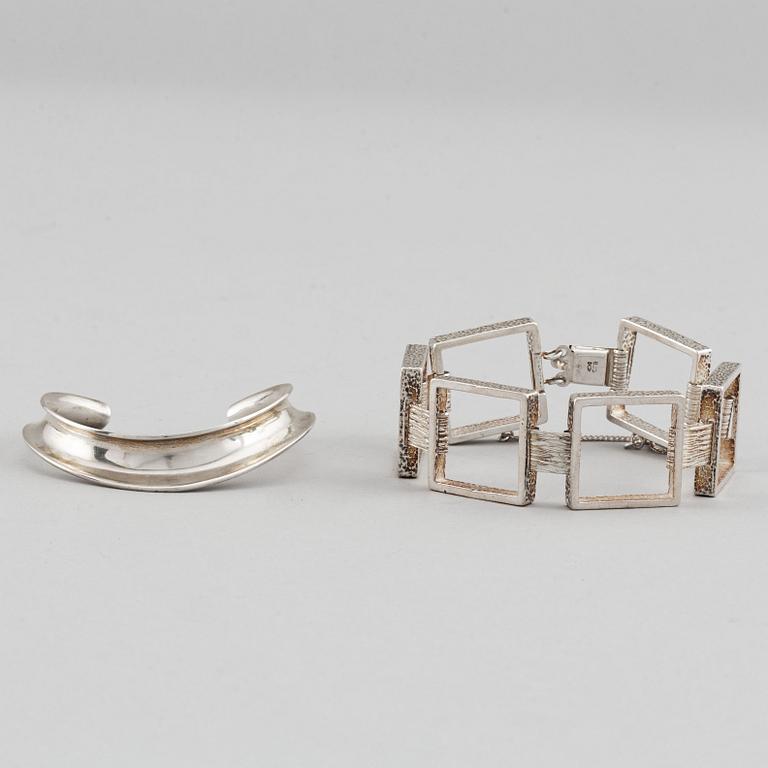 Two silver bracelets, including Denmark.
