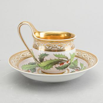 A KPM porcelain cup and saucer ca 1813-15.