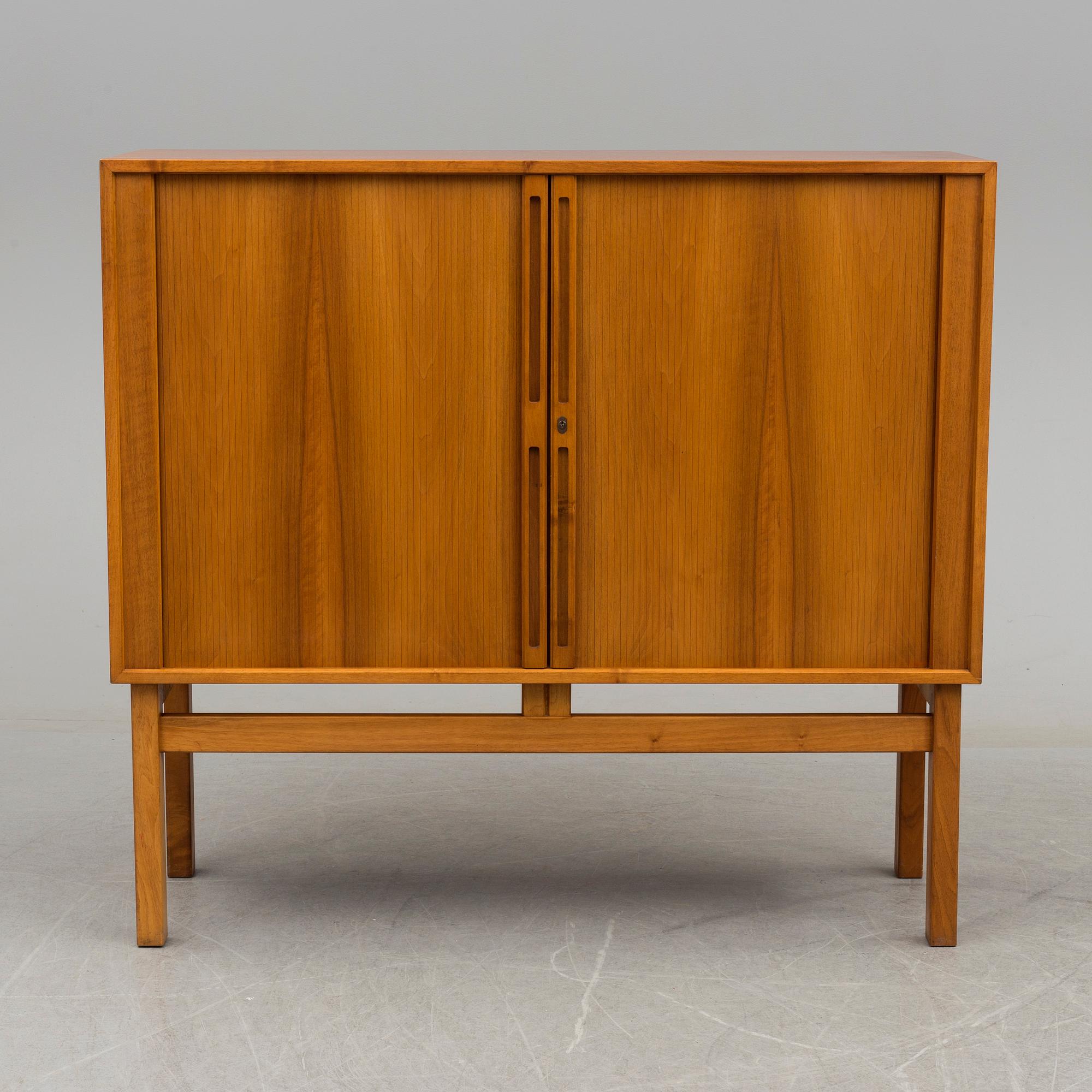 A Walnut veneered cabinet, 1950's/60's.