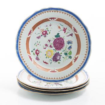 A set of four famille rose dinner plates, Qing dynasty, Qianlong (1736-95).
