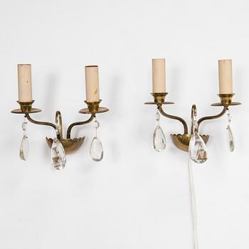 Four of mid-20th century wall sconces.