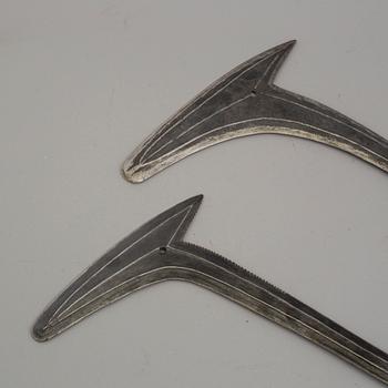 Two 20th century sickle swords.