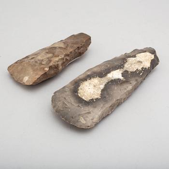 Two neolithic flint axes.