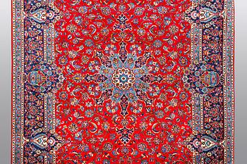A carpet, Kashan 353 x 244 cm.