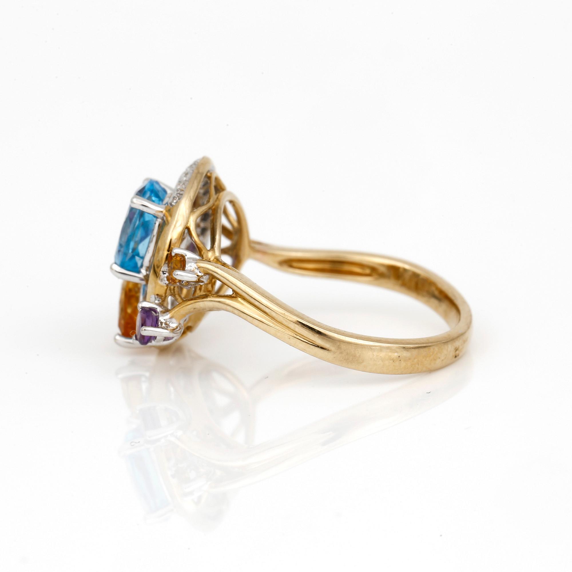 RING, 14K guld med citriner, ametister, blå topas och små diamanter. Vikt ca 3,70 g.