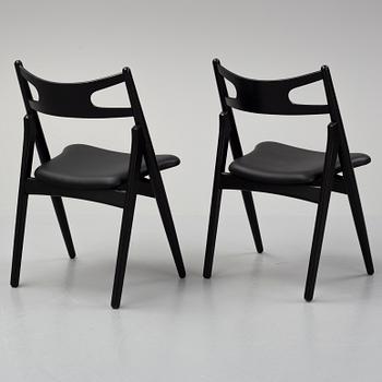 Hans J Wegner,  four 'CH29P Sawbuck' chairs, Carl Hansen, 2007.