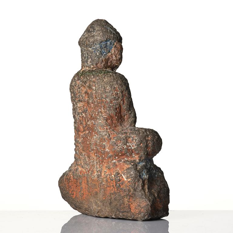 A stone sculpture of Buddha, Ming style.