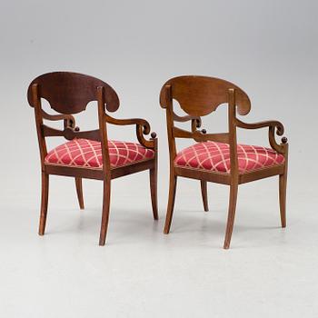 A pair of Karl Johan mahogany armchairs first half of the 19th century.