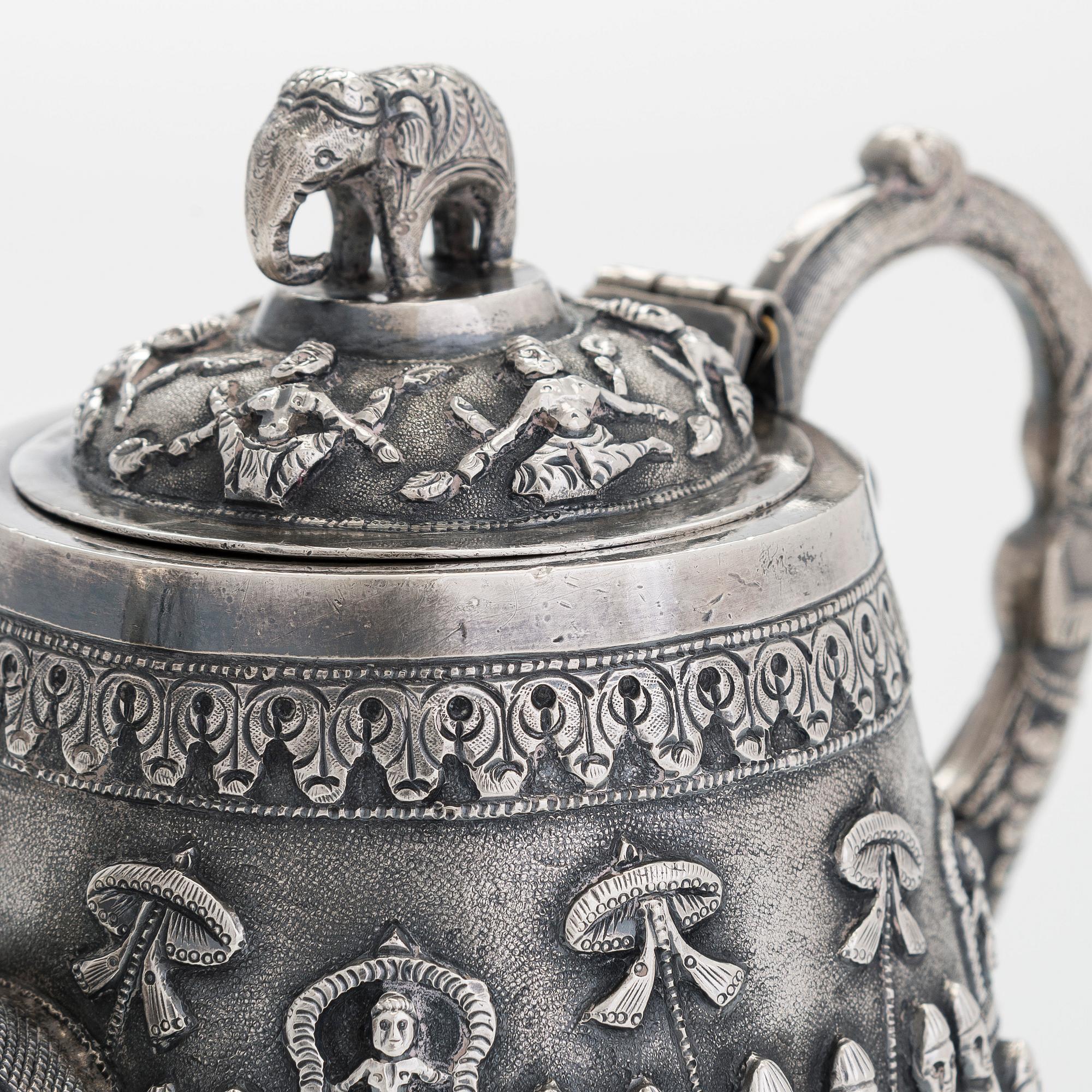 An Indian silver teapot.
