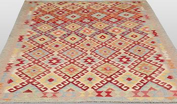 A Kilim rug, approx. 251 x 189 cm.